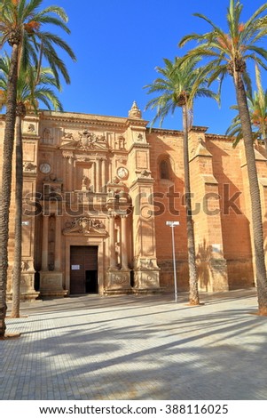 Tall palm trees in front of the Cathedral of Almeria (Cathedral of the Incarnation of Almeria), Andalusia, Spain