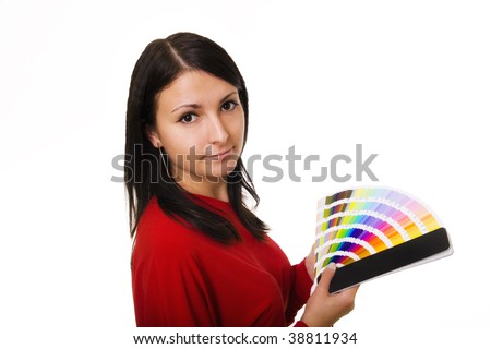 Stock photo of a young woman holding color guide