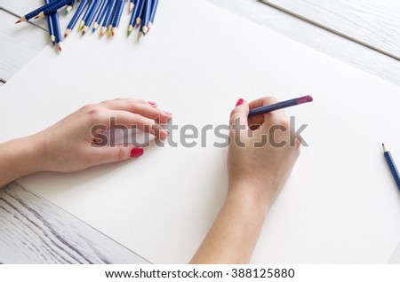 Hands and pencils