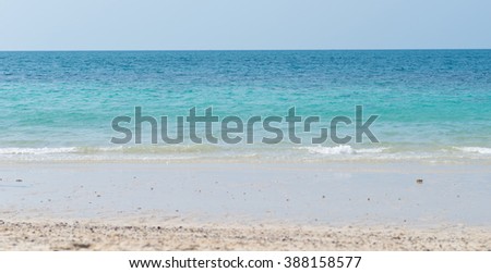 view of blue sea with sky and sand. Seascape