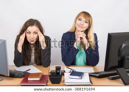 The situation in the office - the girl was very tired from his colleagues Royalty-Free Stock Photo #388191694
