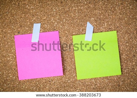 paper note on cork board. cork board with blank notes. sticker note