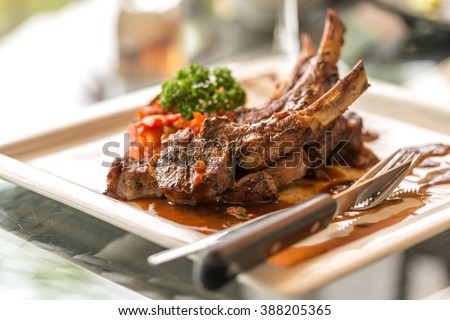 Grilled Race of New Zealand lamb with Rosemary Sauce  International food  at hotel
 Royalty-Free Stock Photo #388205365