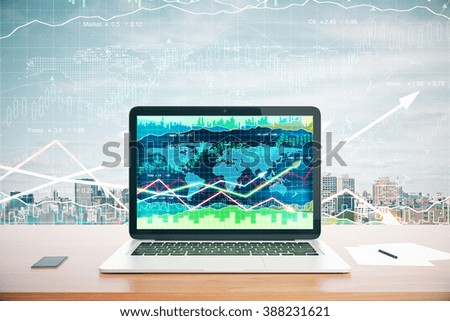 Business grpahs with raising arrows on laptop screen at business chart background