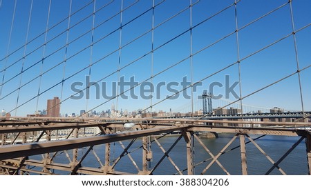 View on Brooklyn Bridge and Manhattan, NYC, USA. Mobile photo.