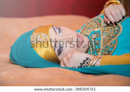 Fashion portrait of young beautiful muslim woman wearing hijab