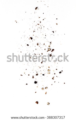 Sifting heavy ground black pepper over white background. Royalty-Free Stock Photo #388307317
