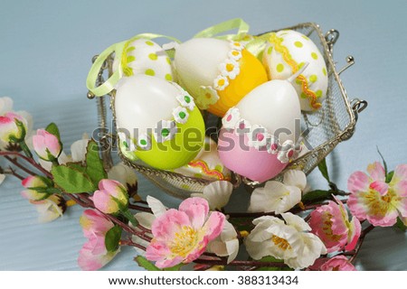 Easter candles in the shape of eggs , selective focus