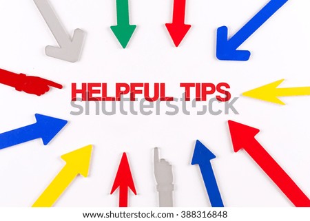 Colorful arrows showing to center with a word HELPFUL TIPS