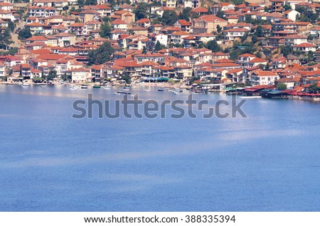 Aerial view of Ohrid Lake, city of Ohrid and mountains in the background. Ohrid is a Macedonian resort and famous tourist destination under the auspices of UNESCO