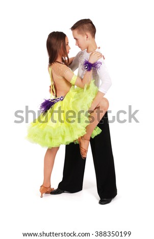 Boy and girl dancing ballroom dance on white background