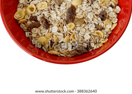 Bowl of cereal with raisins isolated on white background