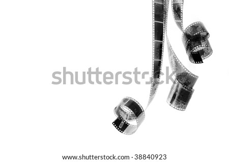 Black and white photo films with family photos hanging against white background