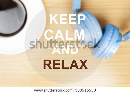 Keep Calm and Relax on on wood table background