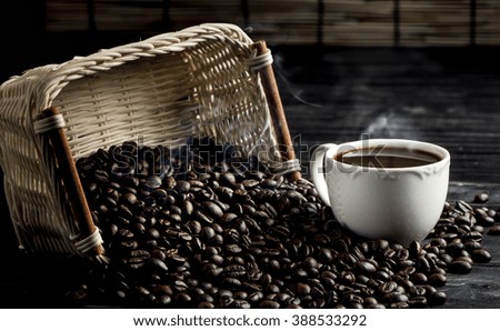 Coffee, coffee cup, hot coffee on wooden table.