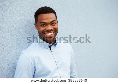 Head and shoulders portrait of young African American man Royalty-Free Stock Photo #388588540