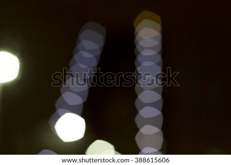 City traffic lights at night. Abstract blurry circles background.