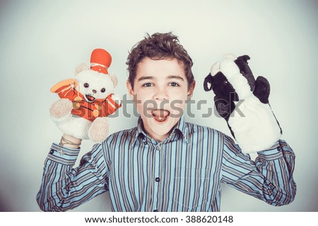 teenager with plush puppets