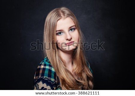 Teenager Girl on Dark Background