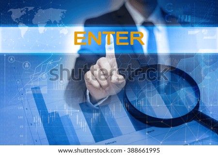 Businessman hand touching ENTER button on virtual screen