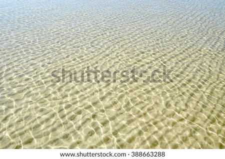 Sand seabed with reflections of the sun,Hua Hin beach Thailand.