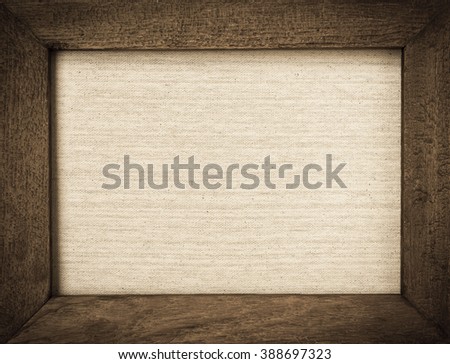 Brown vintage style wooden frame on canvas background