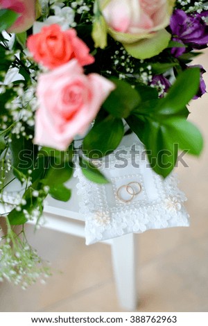 wedding flowers and rings 