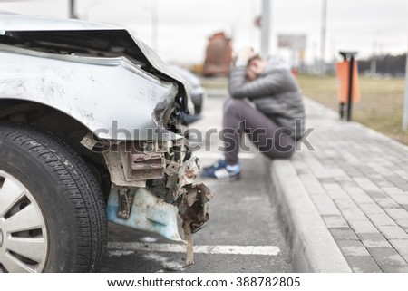 broken car after the accident in  foreground Royalty-Free Stock Photo #388782805