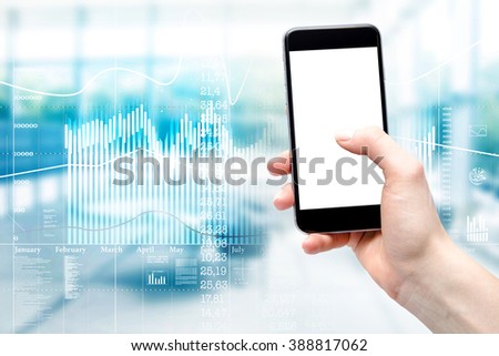 Double exposure with charts and use your smartphone by the woman in business