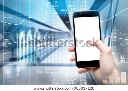 Double exposure with charts and use your smartphone by the woman in business