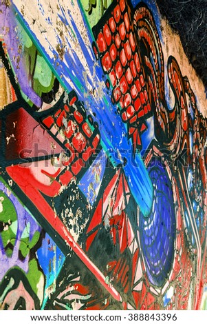 Beautiful street art of graffiti. Abstract color creative drawing fashion on  walls of city. Urban contemporary culture. The original dot pattern with selective focus in future. Creative design option