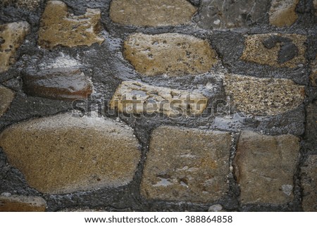 Historic Old cobbles small rock wet path
