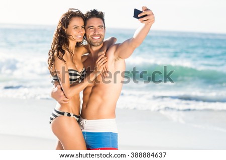Couple taking a selfie on a sunny day