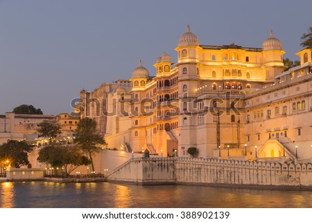 This photo was shot from Udaipur city at twilight time. Udaipur city palace was built over a period of nearly 400 years being contributed by several kings of the dynasty.  Royalty-Free Stock Photo #388902139