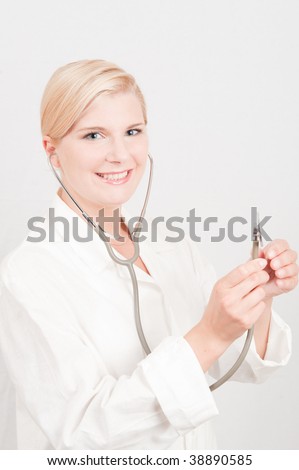 Optimistic female doctor with stethoscope