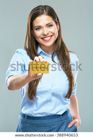 Happy smiling business woman showing credit card. Portrait of smiling business woman.