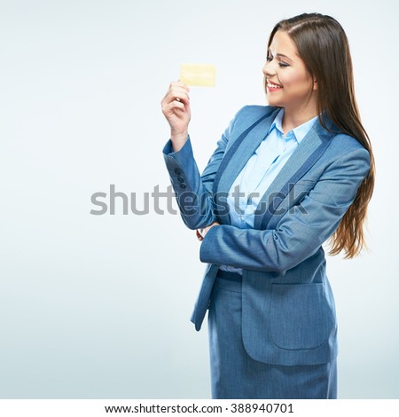 Happy business woman in suit credit card show. White background isolated.