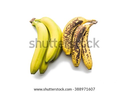Ripen and fresh bananas isolated on white.