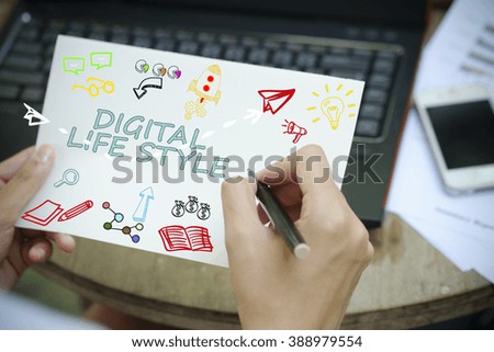 hand drawing  DIGITAL LIFE concept on white notebook , business concept , business idea , strategy concept