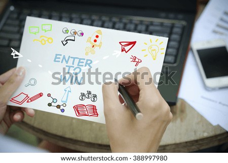 hand drawing ENTER TO WIN concept on white notebook , business concept , business idea , strategy concept
