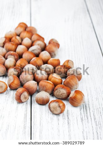 close-up of hazelnuts on a old wooden table