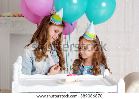 Two girls are having birthday party