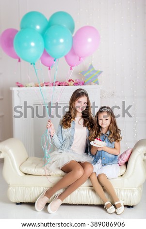 Two girls are celebrating birthday 