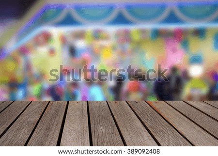 blurred image wood table and abstract Children's playground at public park