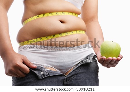 fat woman with unzip jeans holding apple, a concept to fight obesity by starting diet