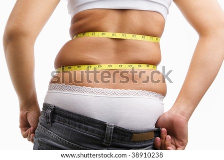 Female wearing jeans that already too small for her, concept to have diet