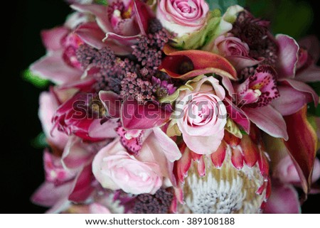 a bouquet of flowers lying on green grass