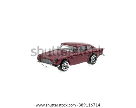 red toy car isolated on white