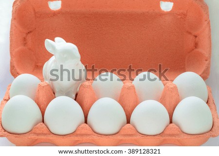 Carton of organic white eggs. 