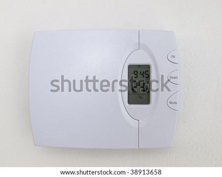 Thermostat isolated on white wall